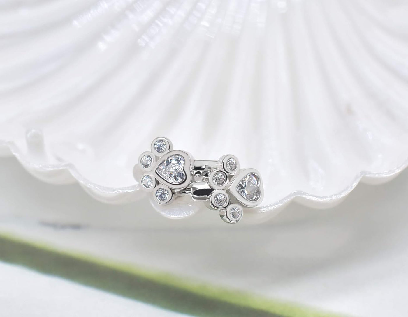 PawGleam | Shining Bond | Sterling Silver Sparkly Paw Print Huggie Earrings
