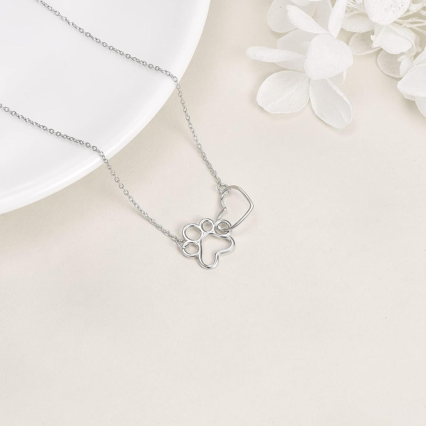 Affection Locket | Paw Print Embrace | Elegant Keepsake